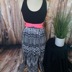 Ankle length Bebe dress with side cutouts.